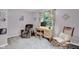 Bedroom with a computer desk, comfortable armchair, and rocking chair for relaxing at 685 N Buffalo Hill Rd, Martinsville, IN 46151