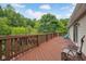Large wooden deck with a wooded view, perfect for outdoor entertaining at 685 N Buffalo Hill Rd, Martinsville, IN 46151