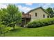 The home's exterior showcases a stone chimney, a private deck, and a walkout basement at 685 N Buffalo Hill Rd, Martinsville, IN 46151