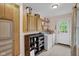 Convenient laundry area with ample storage cabinets and modern washer and dryer set at 685 N Buffalo Hill Rd, Martinsville, IN 46151