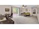 Bright living room with sliding glass doors that lead to a deck at 685 N Buffalo Hill Rd, Martinsville, IN 46151
