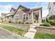Charming home with a stone retaining wall, landscaped garden, and an American flag proudly displayed at 7092 Cherry Creek Blvd, Carmel, IN 46033
