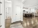 Open-concept interior showcasing the kitchen, fireplace, and living room at 7092 Cherry Creek Blvd, Carmel, IN 46033