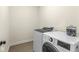 Efficient laundry room featuring a modern washer and dryer set at 7092 Cherry Creek Blvd, Carmel, IN 46033