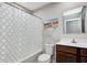 Modern bathroom showcasing a decorative beach-themed picture above the sink at 7195 E Rising Sun S Cir, Camby, IN 46113