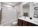 Bright bathroom with a modern vanity, decorative shower curtain, and a clean, well-lit space at 7195 E Rising Sun S Cir, Camby, IN 46113