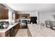 Efficient kitchen with stainless appliances, spacious countertops, and a convenient island with bar seating at 7195 E Rising Sun S Cir, Camby, IN 46113