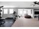 Open basement with workout area, living space, and play area at 7450 Cassilly Ct, Indianapolis, IN 46278