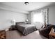 Basement bedroom with neutral decor, recessed lighting, and a comfortable queen sized bed at 7450 Cassilly Ct, Indianapolis, IN 46278