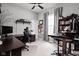 Home office with large desk and ceiling fan at 7450 Cassilly Ct, Indianapolis, IN 46278
