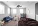 Bright playroom with lots of natural light, play couch, beanbag chair, and toys at 7450 Cassilly Ct, Indianapolis, IN 46278