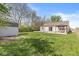 The home's backyard is an attractive green space with gazebo and garden shed at 7841 Whitaker Farms Ln, Indianapolis, IN 46237