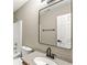 Bathroom featuring a vanity sink, mirror, and a shower-tub combination at 7841 Whitaker Farms Ln, Indianapolis, IN 46237