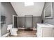 Elegant bathroom with marble vanity, modern fixtures, and stylish design at 7845 Allisonville Rd, Indianapolis, IN 46250