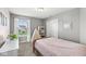 Cozy bedroom showcasing neutral walls, natural light, and a charming teepee bookshelf at 7901 Apalachee Dr, Indianapolis, IN 46217