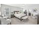 Serene bedroom featuring a cozy bed, natural light, and tasteful decor for ultimate comfort and relaxation at 7901 Apalachee Dr, Indianapolis, IN 46217