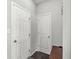 Hallway featuring a storage area, and hardwood flooring at 7901 Apalachee Dr, Indianapolis, IN 46217