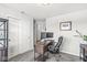 Functional home office with a modern desk setup, comfortable seating, and natural light at 7901 Apalachee Dr, Indianapolis, IN 46217