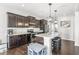 Well-appointed kitchen with stainless steel appliances, an island with seating, and ample cabinet space at 7901 Apalachee Dr, Indianapolis, IN 46217