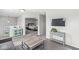 Bright living area with stylish decor, a TV, and an inviting view into the bedroom, creating an airy atmosphere at 7901 Apalachee Dr, Indianapolis, IN 46217