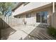 Back patio area with a sliding glass door and privacy fence at 8116 Cheswick Dr, Indianapolis, IN 46219