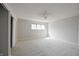 Bedroom with window, closet, and fan at 8116 Cheswick Dr, Indianapolis, IN 46219