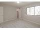 Cozy bedroom featuring a large window and closet space at 8116 Cheswick Dr, Indianapolis, IN 46219