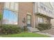 Brick and wood facade townhome with a small front yard at 8116 Cheswick Dr, Indianapolis, IN 46219