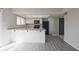 Modern kitchen featuring sleek appliances, laminate countertops, and laminate flooring at 8116 Cheswick Dr, Indianapolis, IN 46219
