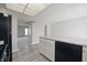 Contemporary kitchen boasts updated appliances, white cabinets, and a breakfast bar at 8116 Cheswick Dr, Indianapolis, IN 46219