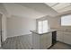 Eat-in kitchen with modern amenities, updated appliances, and access to a private patio at 8116 Cheswick Dr, Indianapolis, IN 46219