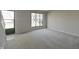Living room with stairs and window at 8116 Cheswick Dr, Indianapolis, IN 46219
