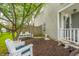 Inviting back yard featuring lounge chairs and a peaceful sitting area at 853 Westpointe Dr, Shelbyville, IN 46176