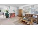 Bright living room with a comfortable sofa, a stylish coffee table, and a decorative screen, perfect for relaxation at 853 Westpointe Dr, Shelbyville, IN 46176