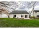 Spacious backyard with a large lawn, complemented by a patio and ample space for outdoor activities at 8618 Turnstone Ct, Indianapolis, IN 46234