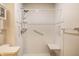 Accessible walk-in shower with grab bars and a built-in seat ensures comfort and safety in this functional bathroom space at 8618 Turnstone Ct, Indianapolis, IN 46234