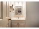 Bright bathroom with vanity and view into mirror reflecting another room at 8618 Turnstone Ct, Indianapolis, IN 46234