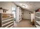 Spacious walk-in closet featuring built-in shelving and carpeted floor at 8618 Turnstone Ct, Indianapolis, IN 46234