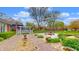The backyard has a lovely pergola and a firepit area at 8842 Rocky Ridge Rd, Indianapolis, IN 46217