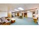 Spacious basement rec room with retro carpet, great for entertaining, and relaxing at 8842 Rocky Ridge Rd, Indianapolis, IN 46217