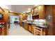Galley kitchen with ample wood cabinetry at 8842 Rocky Ridge Rd, Indianapolis, IN 46217