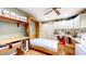 Multi-purpose room with Murphy bed, sewing area and storage for functionality and organization at 8842 Rocky Ridge Rd, Indianapolis, IN 46217