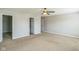 Spacious bedroom with a ceiling fan and neutral carpet, perfect for relaxation at 8888 N White Tail N Trl, McCordsville, IN 46055