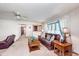 Comfortable living room with traditional furnishings and access to other rooms at 990 Broadway N Dr, Plainfield, IN 46168