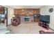 Relaxing living room with fireplace and built-in shelves at 990 Broadway N Dr, Plainfield, IN 46168