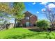 Back view of a home with a backyard and patio furniture on the deck at 10715 Hamilton Pass, Fishers, IN 46037