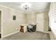 Bedroom featuring carpet floors, neutral paint, and ample natural light at 10715 Hamilton Pass, Fishers, IN 46037