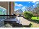Relaxing deck area with outdoor seating, perfect for entertaining and enjoying the beautiful backyard views at 10715 Hamilton Pass, Fishers, IN 46037