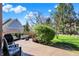 Spacious wooden deck featuring comfortable outdoor seating, a grill, and picturesque views of the lush backyard at 10715 Hamilton Pass, Fishers, IN 46037