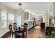 Spacious kitchen with dining area, gray cabinets, and stainless steel appliances at 10715 Hamilton Pass, Fishers, IN 46037